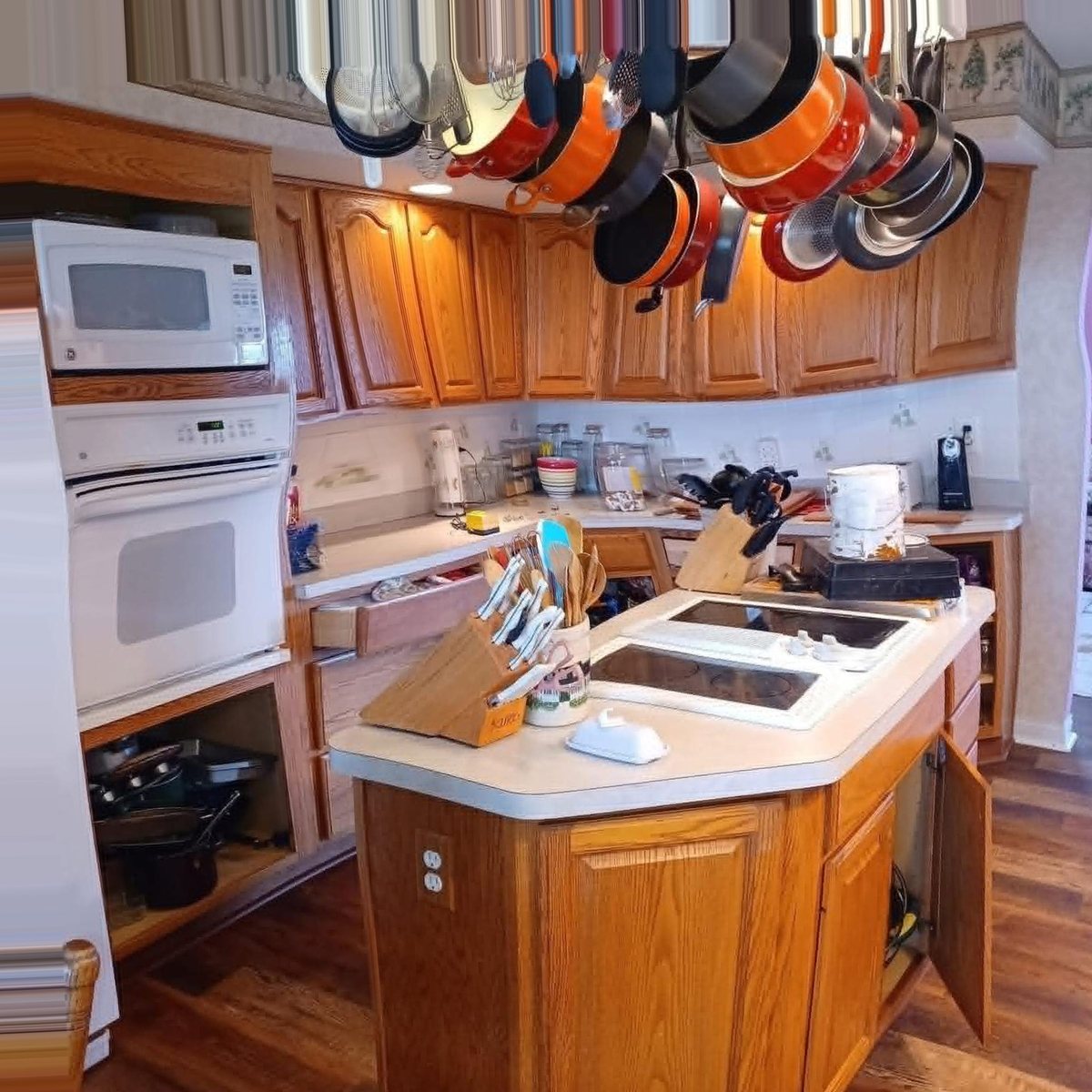 Kitchen with original oak cabinets and island